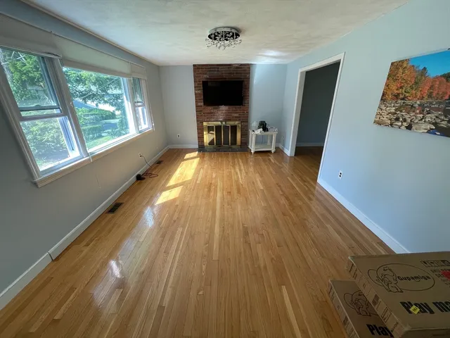 a view of livingroom with furniture and wooden floor