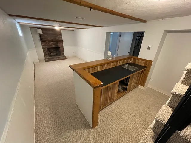 a kitchen with stainless steel appliances granite countertop a stove and a refrigerator