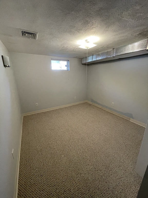 18 Charles Street Lexington, MA 02421 - Photo 24 of 30 a view of empty room