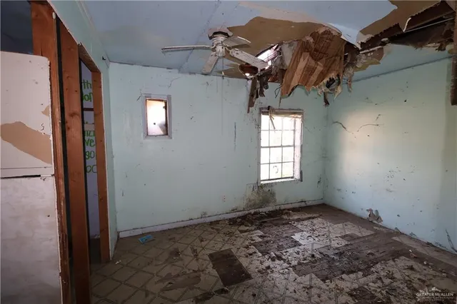 an empty room with windows