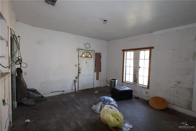 a view of a livingroom with furniture and window