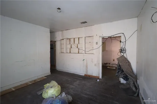a view of storage and utility room with closet
