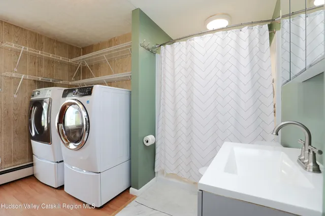 a utility room with dryer and washer