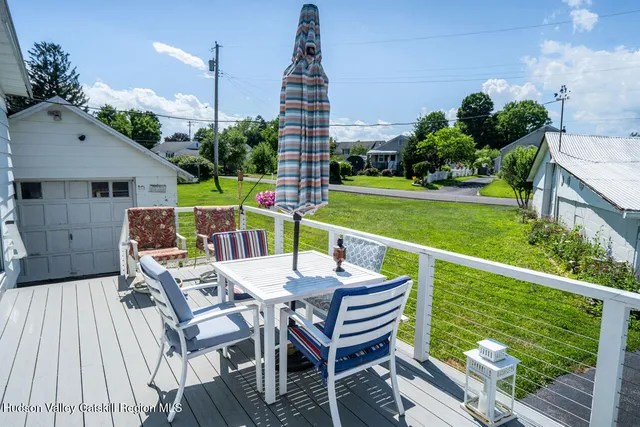 a view of an chairs and tables in the patio