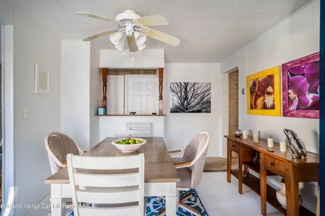 a workspace with furniture and window