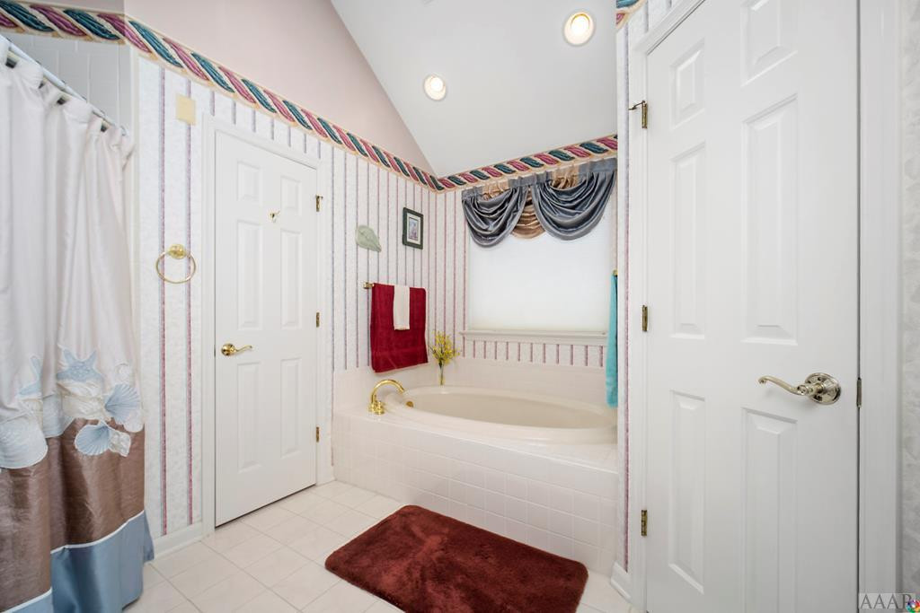 218 Brumsey Road Currituck, NC 27929 - Photo 20 of 35 Jetted tub & tile shower