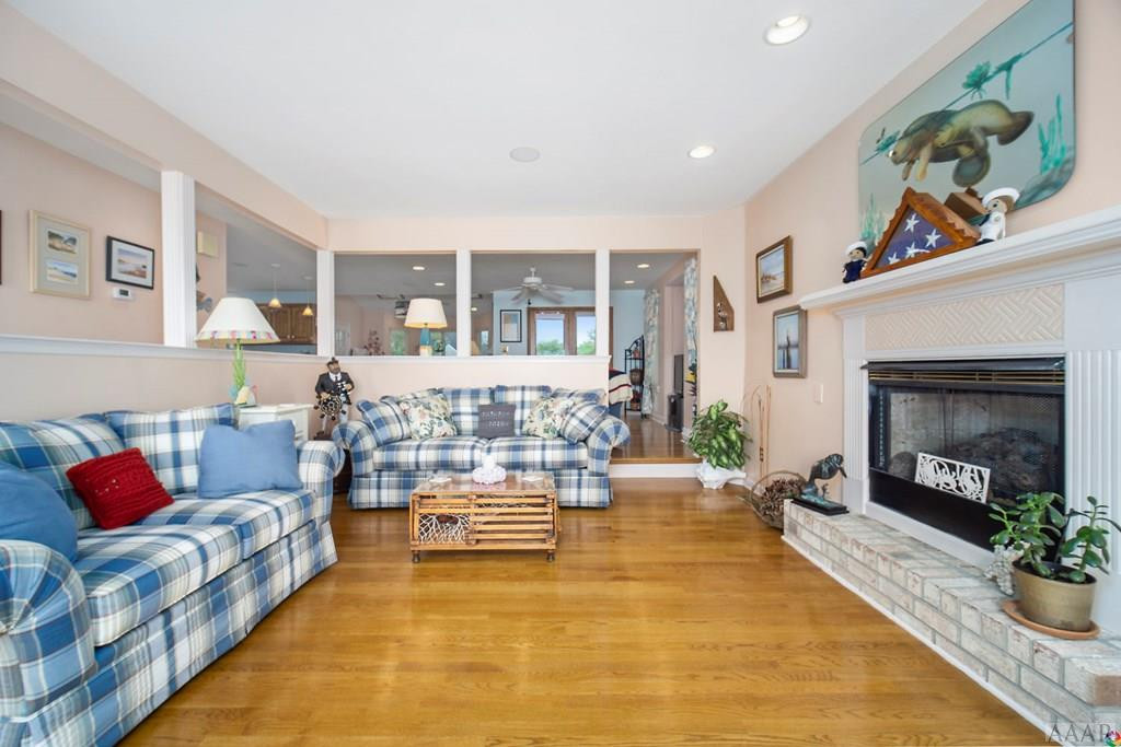 218 Brumsey Road Currituck, NC 27929 - Photo 5 of 35 Living room w/ fireplace