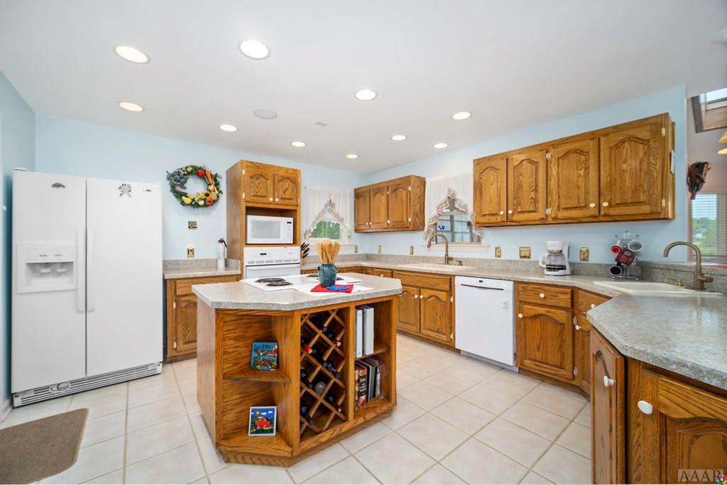 218 Brumsey Road Currituck, NC 27929 - Photo 10 of 35 Island with wine rack