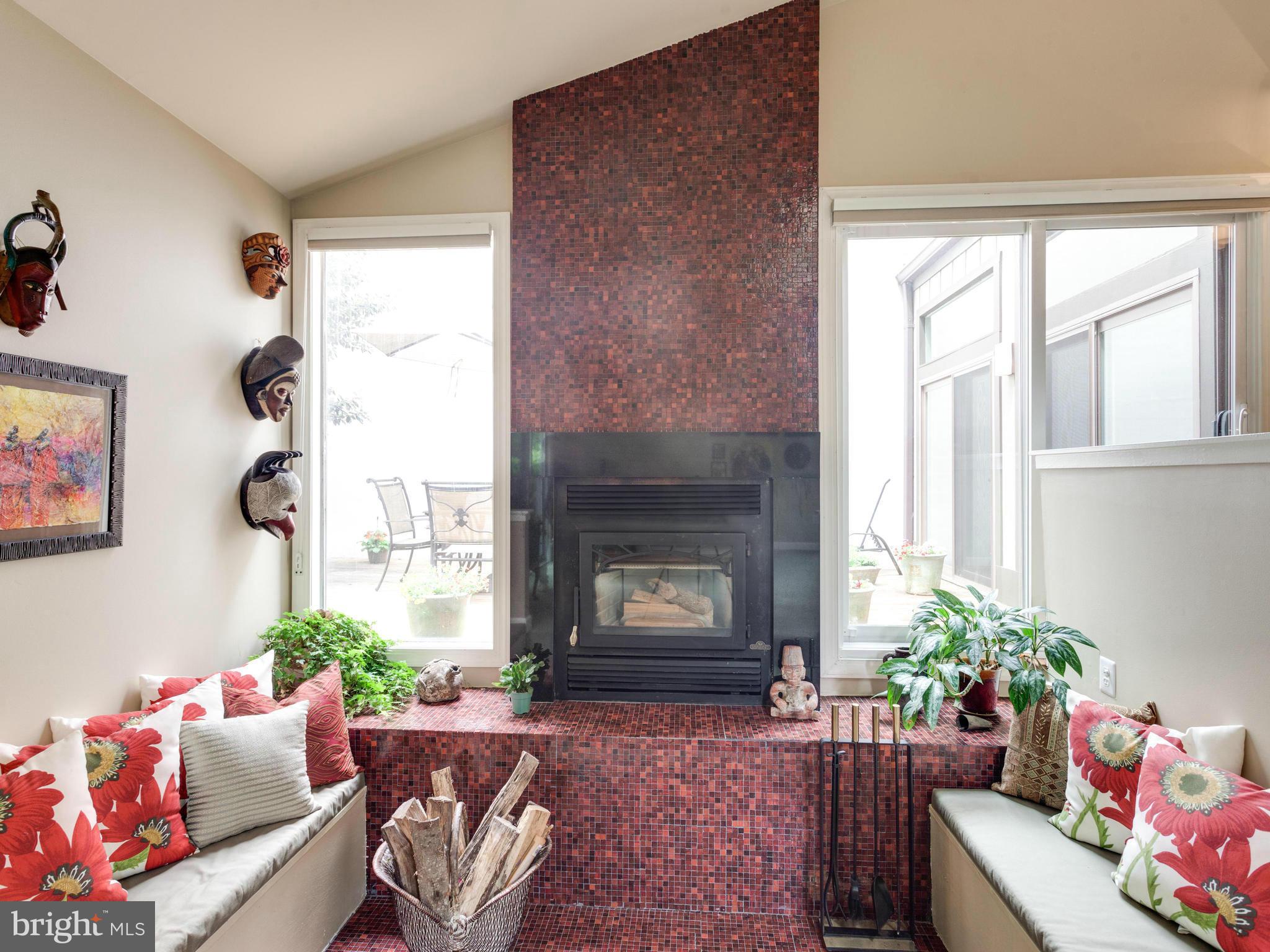 2357 Glade Bank Way Reston, VA 20191 - Photo 15 of 30 a living room with furniture and a fireplace
