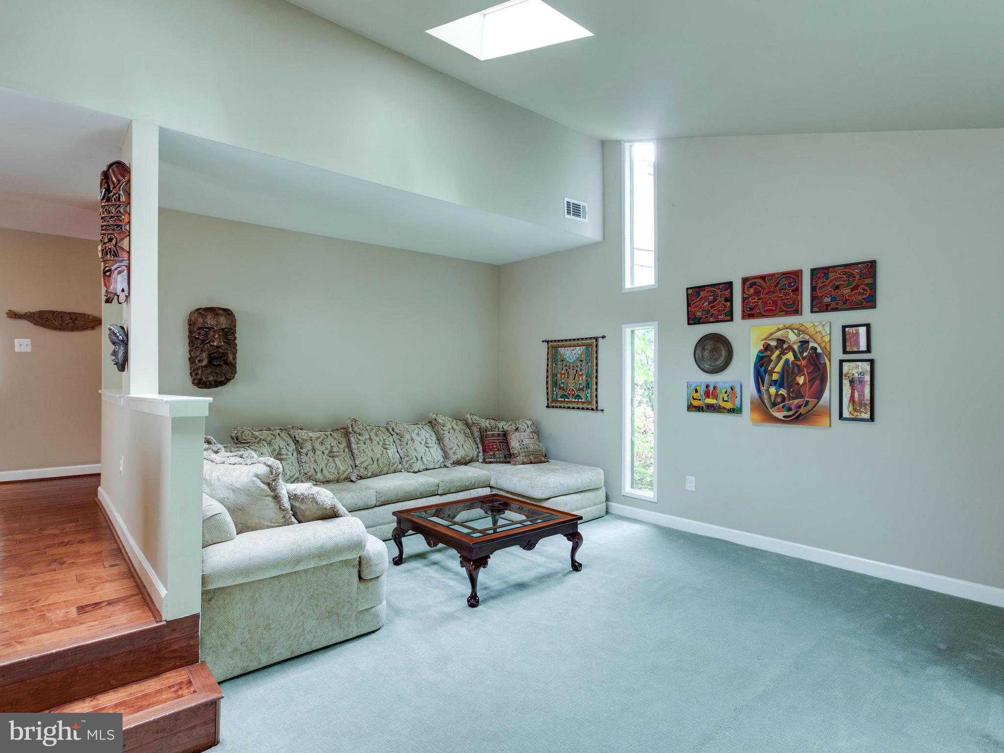 2357 Glade Bank Way Reston, VA 20191 - Photo 16 of 30 a living room with furniture and a couch