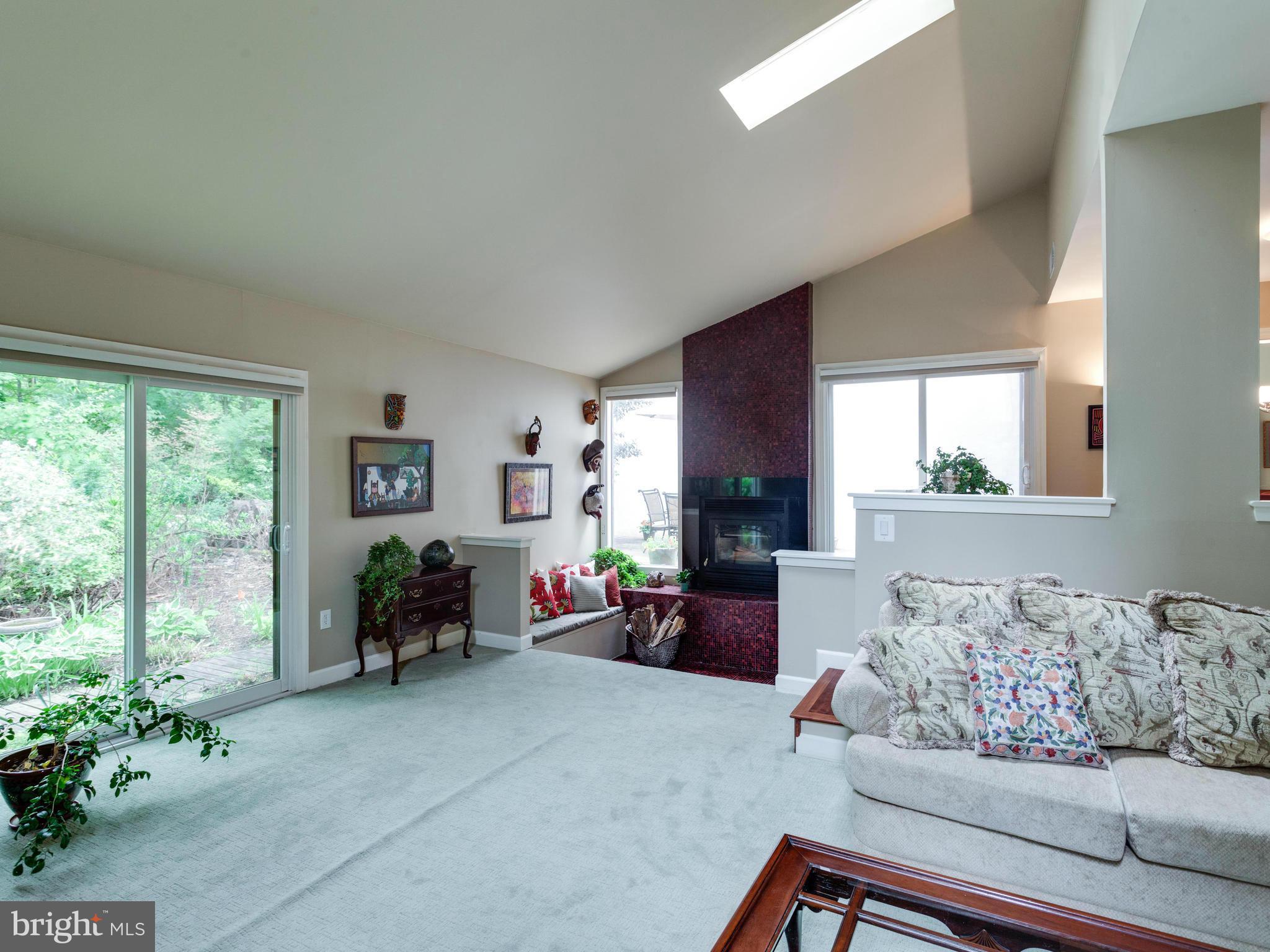 2357 Glade Bank Way Reston, VA 20191 - Photo 17 of 30 a living room with furniture and a large window