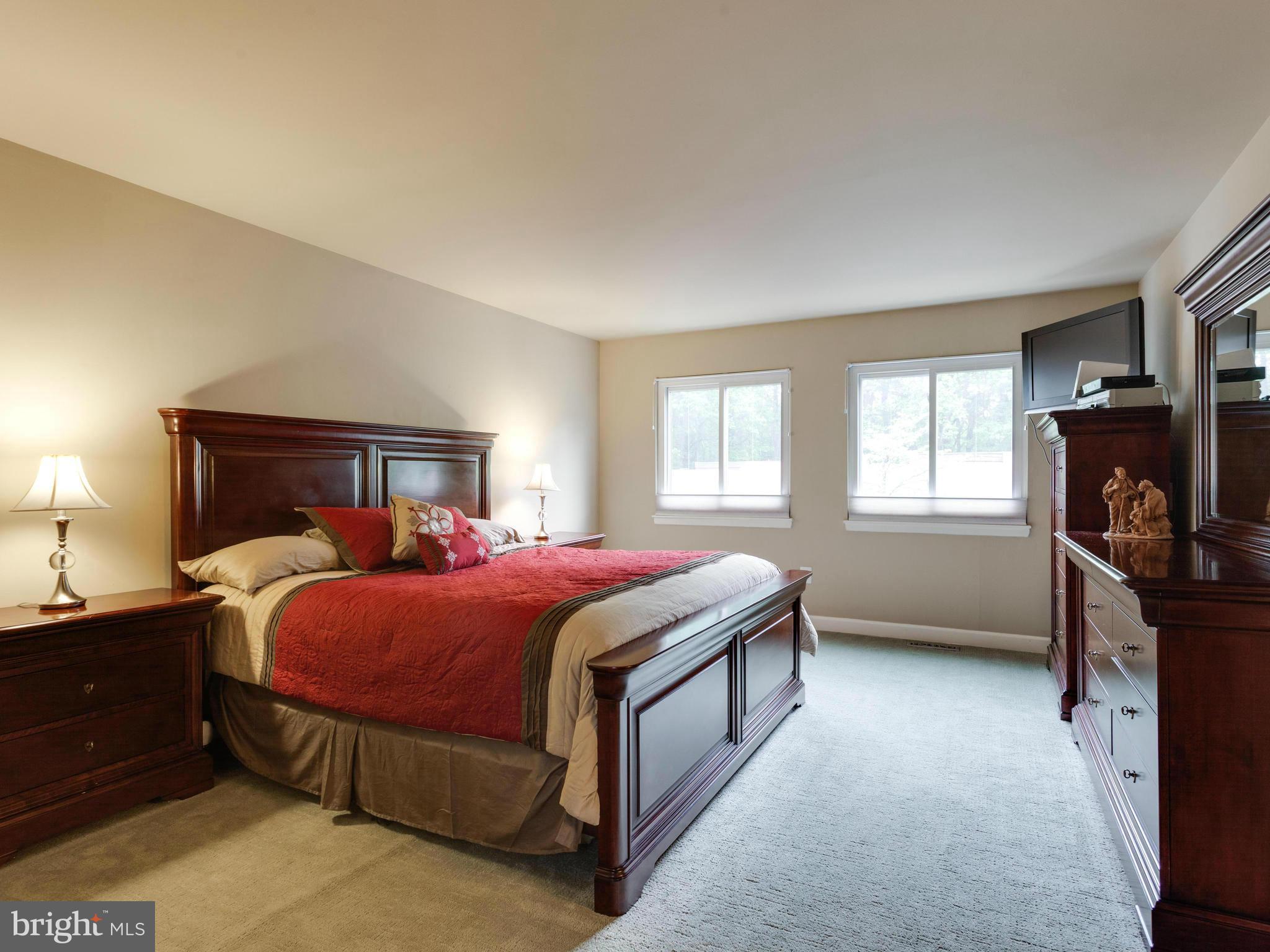 2357 Glade Bank Way Reston, VA 20191 - Photo 21 of 30 a bedroom with a bed and a window