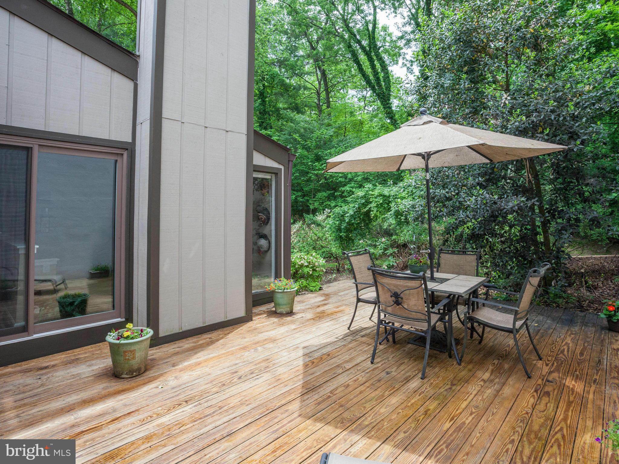 2357 Glade Bank Way Reston, VA 20191 - Photo 27 of 30 an outdoor space with furniture and umbrella