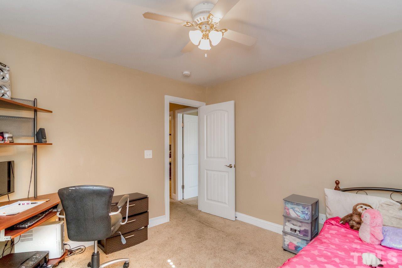 210 Orkney Road Stem, NC 27581 - Photo 19 of 26 a workspace with a window