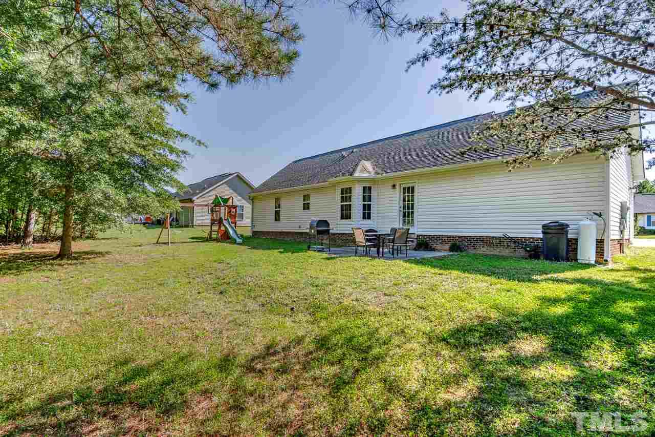 210 Orkney Road Stem, NC 27581 - Photo 5 of 26 a front view of house with yard and green space