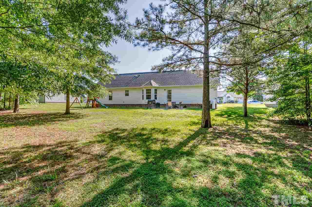 210 Orkney Road Stem, NC 27581 - Photo 7 of 26 a view of a house with a yard
