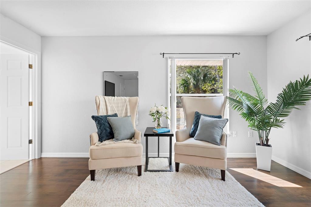 2053 Bond Road DeLand, FL 32720 - Photo 16 of 51 a living room with furniture and a large window