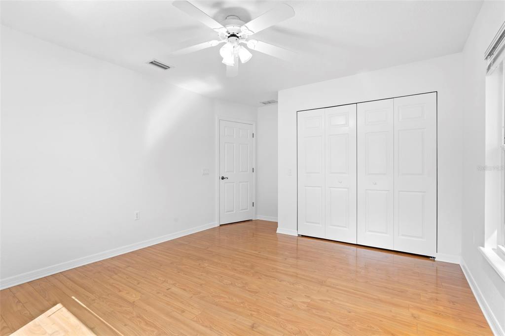 2053 Bond Road DeLand, FL 32720 - Photo 22 of 51 wooden floor in an empty room