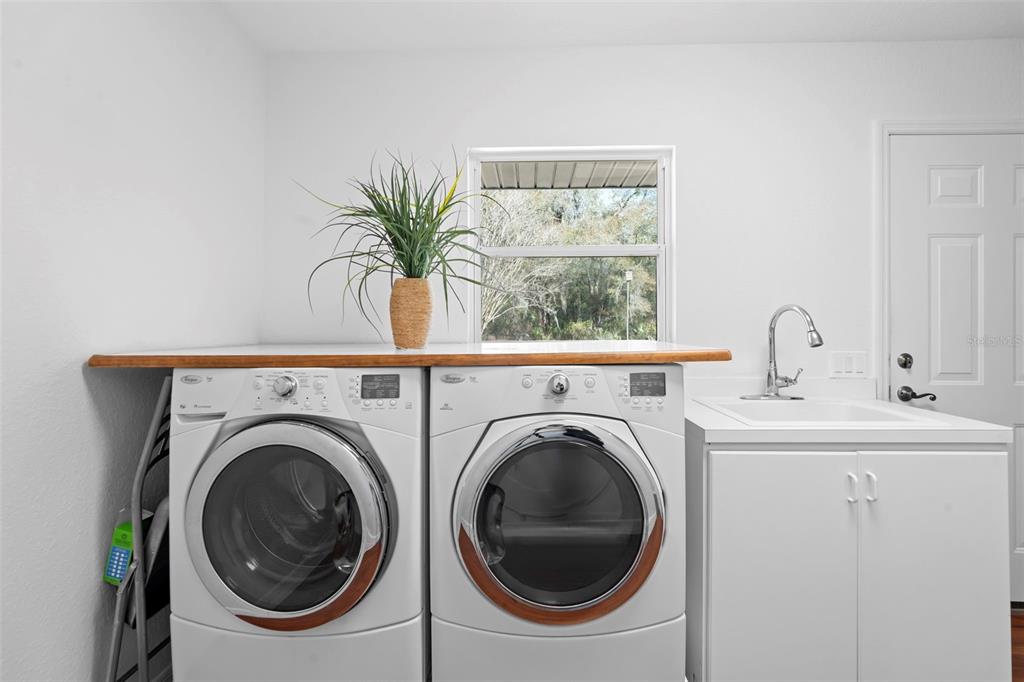 2053 Bond Road DeLand, FL 32720 - Photo 29 of 51 a view of livingroom with washer and dryer