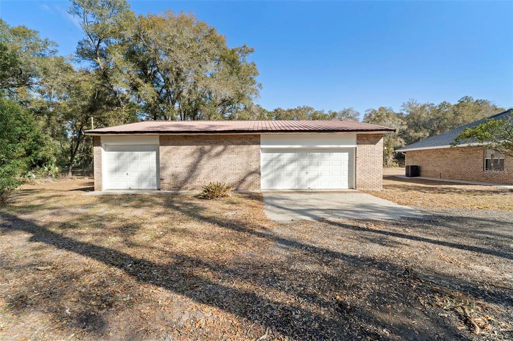 2053 Bond Road DeLand, FL 32720 - Photo 32 of 51 a view of a house with a yard