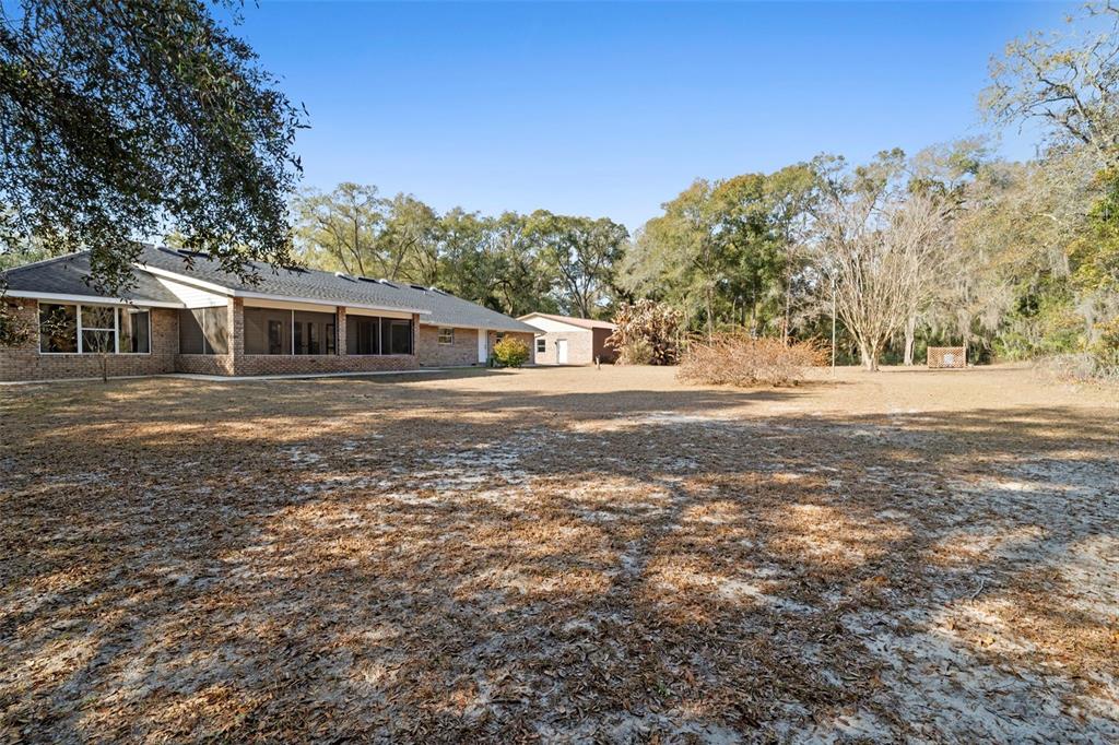 2053 Bond Road DeLand, FL 32720 - Photo 37 of 51 a view of a house with a yard