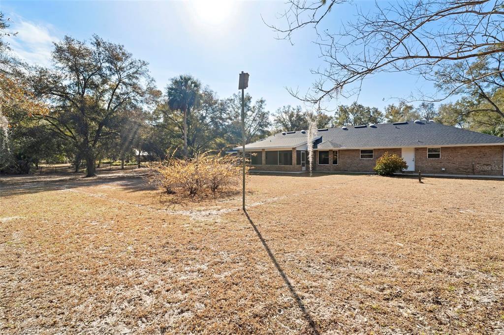 2053 Bond Road DeLand, FL 32720 - Photo 38 of 51 a view of house with snow on the road