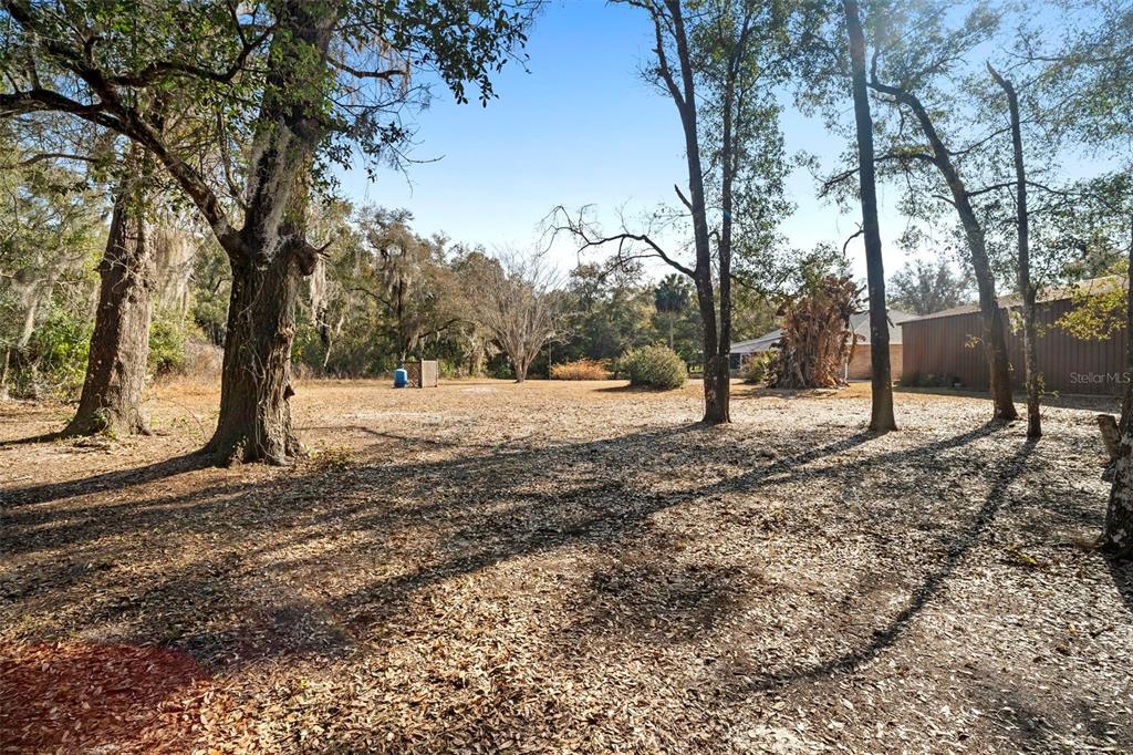 2053 Bond Road DeLand, FL 32720 - Photo 39 of 51 a view of outdoor space with trees
