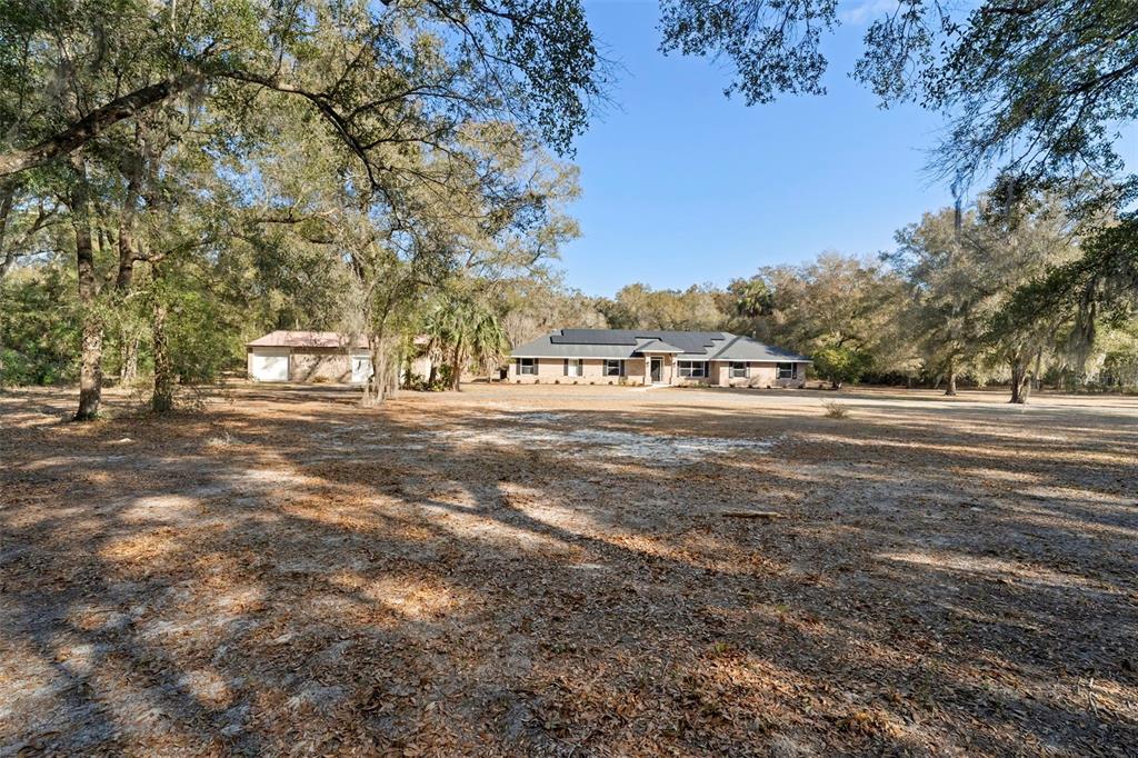 2053 Bond Road DeLand, FL 32720 - Photo 40 of 51 a view of road with trees
