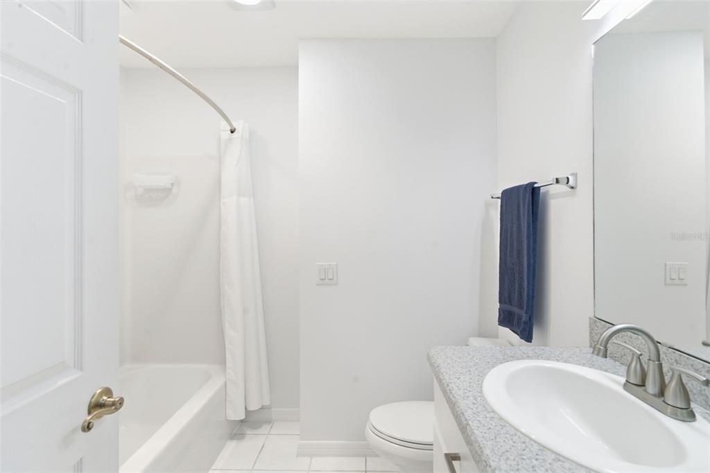 2053 Bond Road DeLand, FL 32720 - Photo 50 of 51 a bathroom with a sink toilet and shower