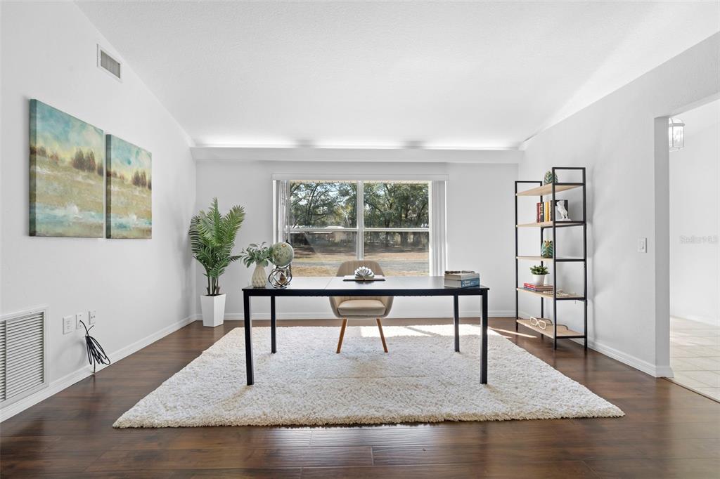 2053 Bond Road DeLand, FL 32720 - Photo 5 of 51 a view of a livingroom with furniture and window