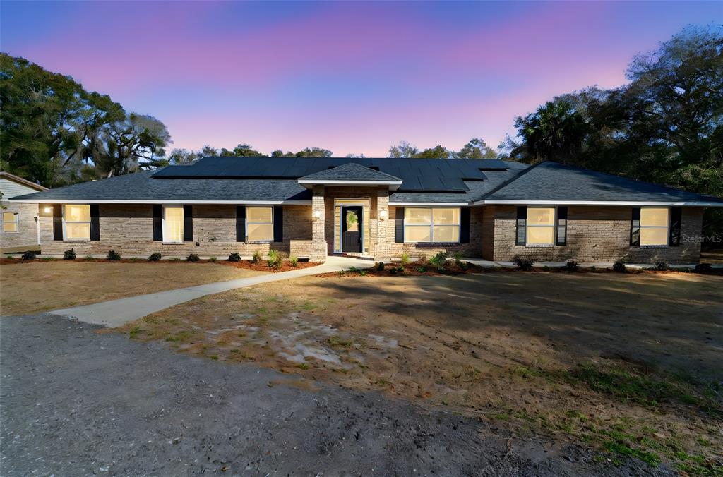 2053 Bond Road DeLand, FL 32720 - Photo 51 of 51 a front view of a house with a yard