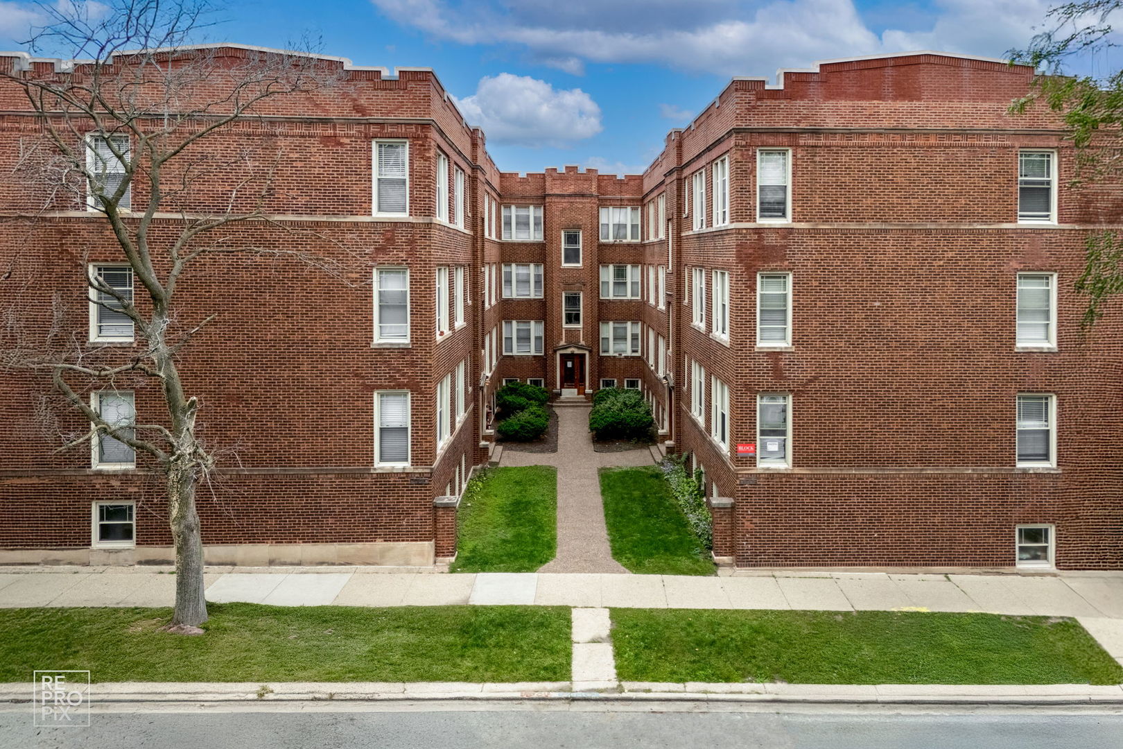 6977 North Bell Avenue, Unit 3 Chicago, IL 60645 - Photo 1 of 15 a front view of a building