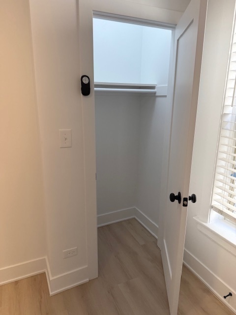 6977 North Bell Avenue, Unit 3 Chicago, IL 60645 - Photo 12 of 15 an empty room with a door