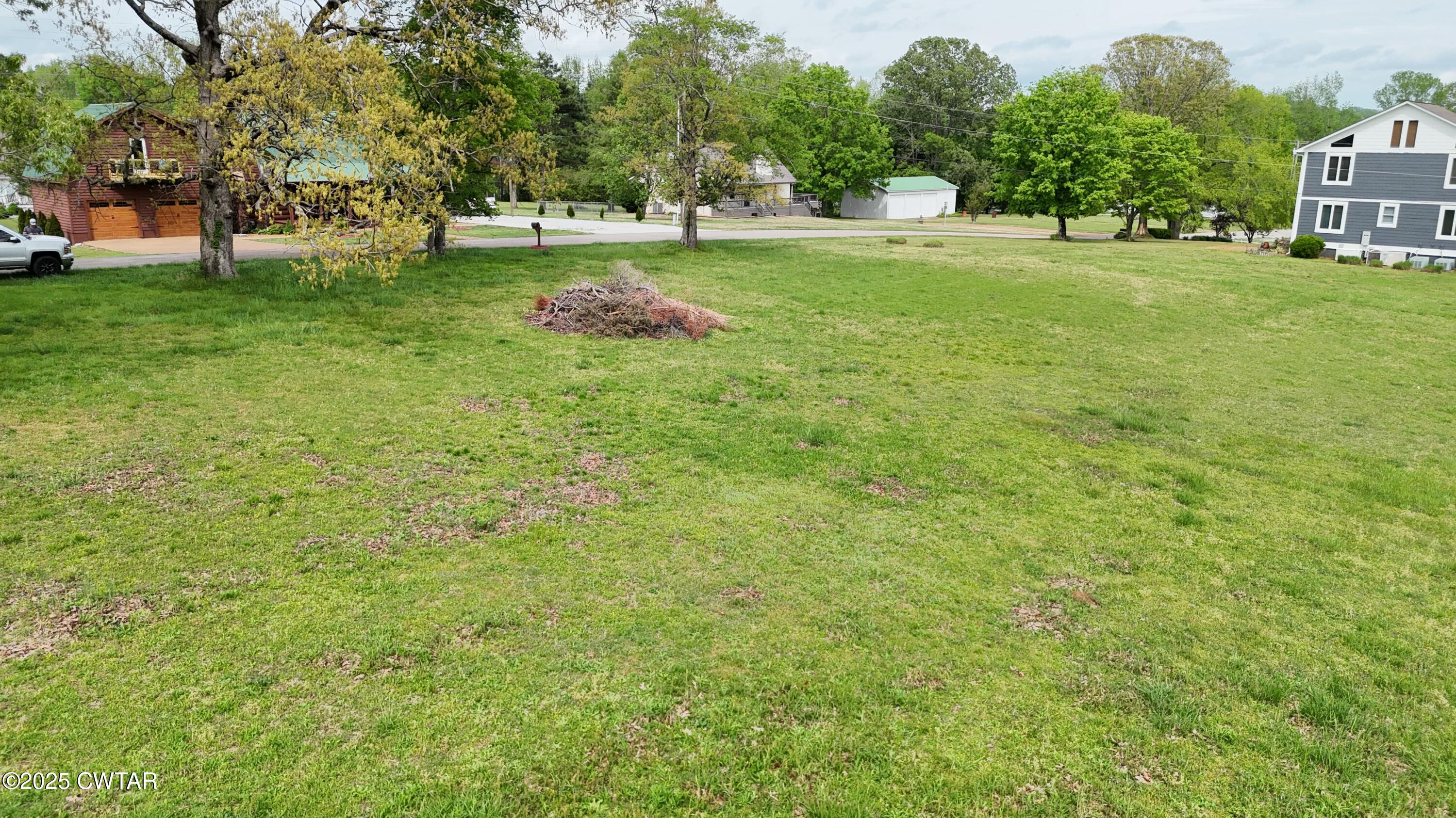 0 Yarbro Harbor Drive Decaturville, TN 38329 - Photo 13 of 16 a huge green field with lots of trees