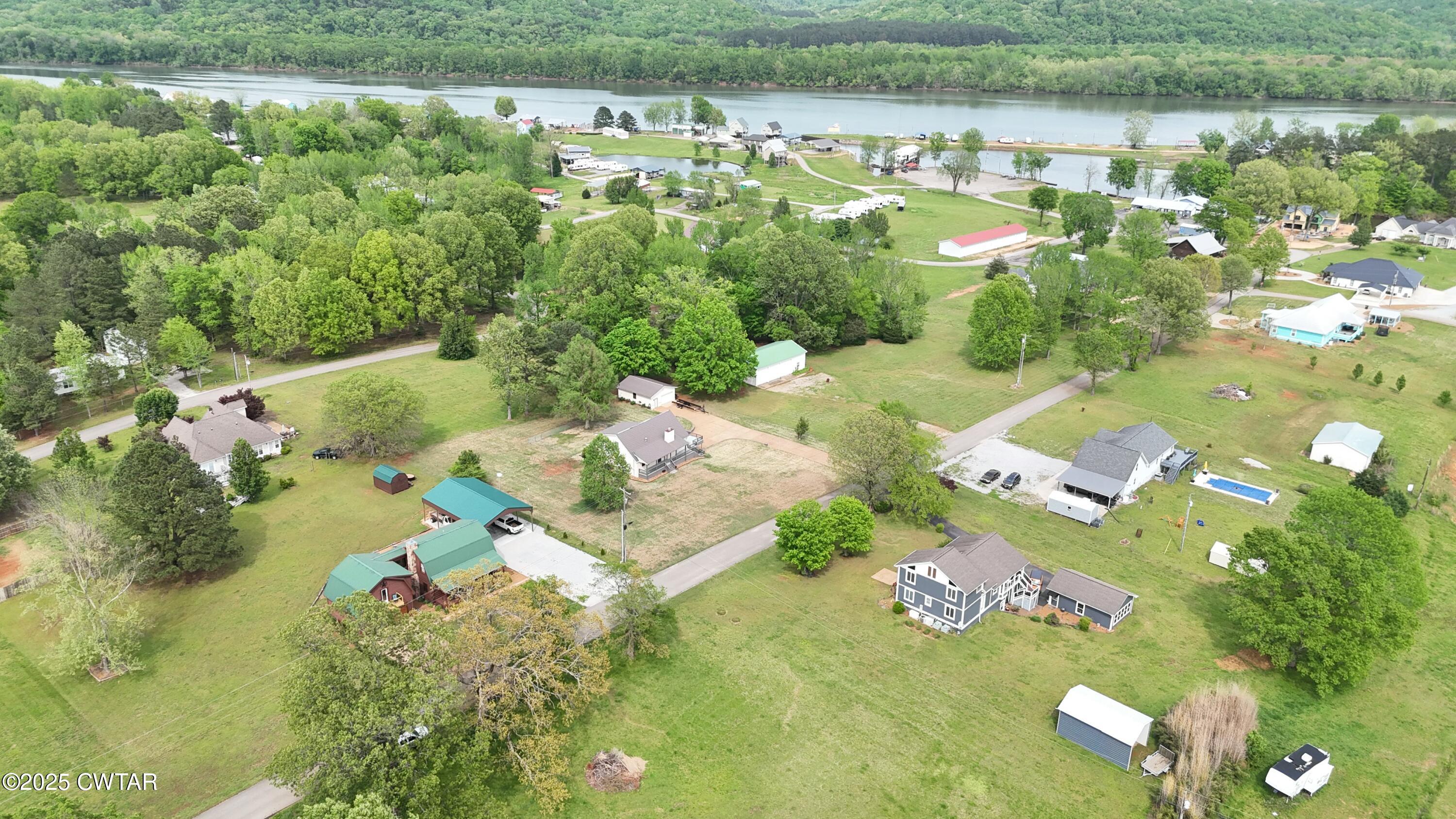 0 Yarbro Harbor Drive Decaturville, TN 38329 - Photo 15 of 16 an aerial view of a house with a lake view