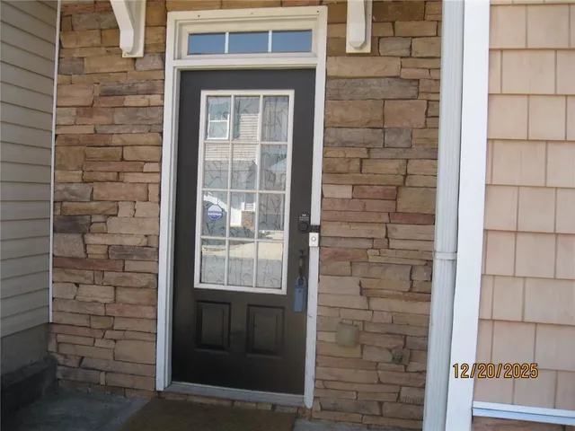 a brick house with a door