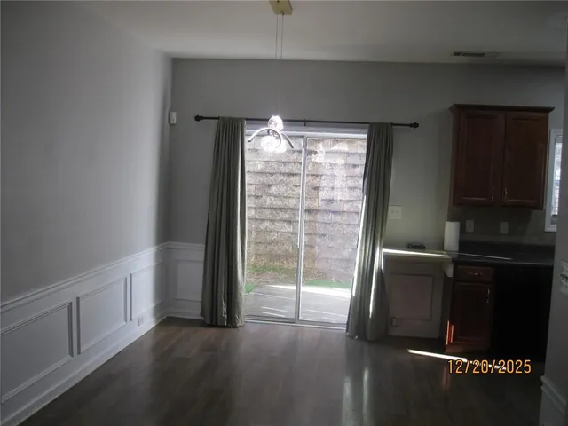 view of room with window and hardwood floor