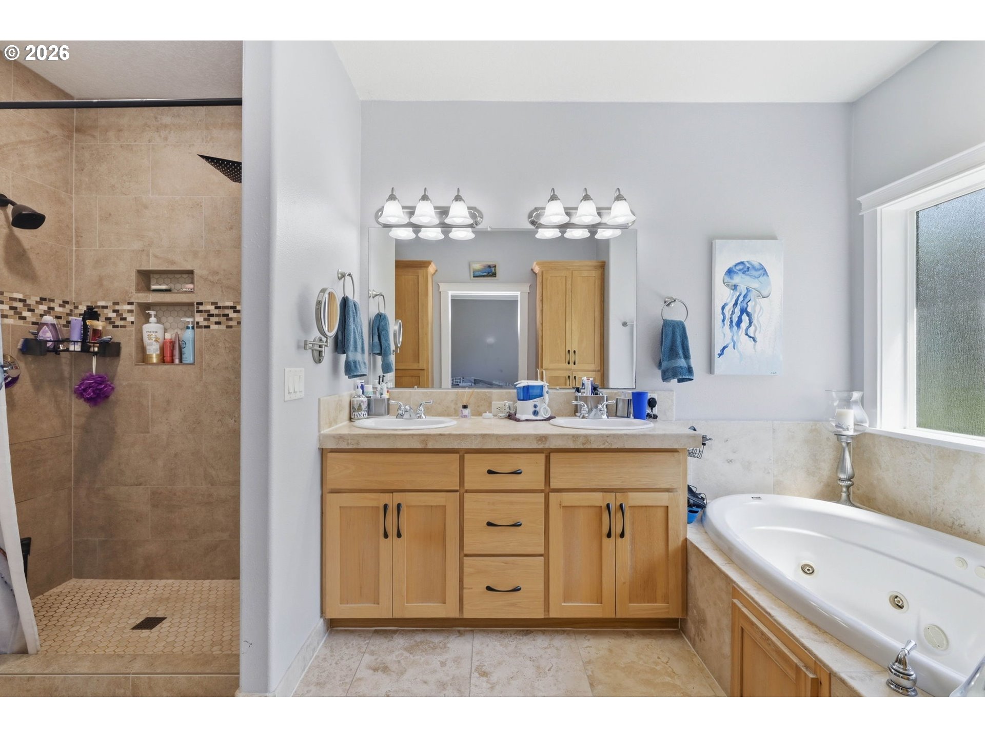 29778 Gimpl Hill Road Eugene, OR 97405 - Photo 19 of 43 a spacious bathroom with a granite countertop sink mirror and shower