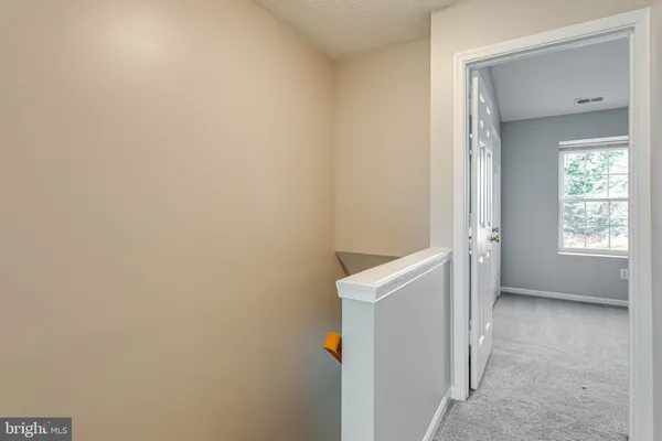 a view of small space with racks on the wall