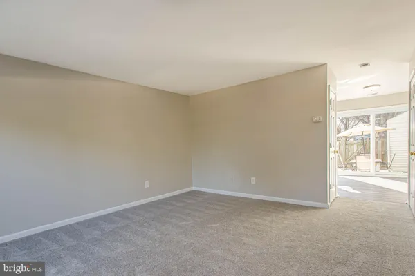a view of a room with an empty space