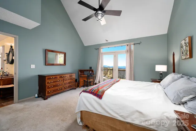 a bedroom with a bed dresser and a window