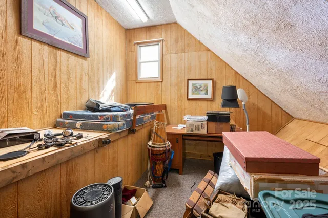 a livingroom with furniture and window