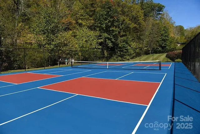 a view of a golf course with a lake