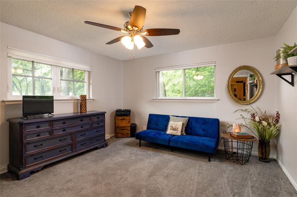 205 Timberlake Drive Azle, TX 76020 - Photo 16 of 40 a living room with furniture and a window
