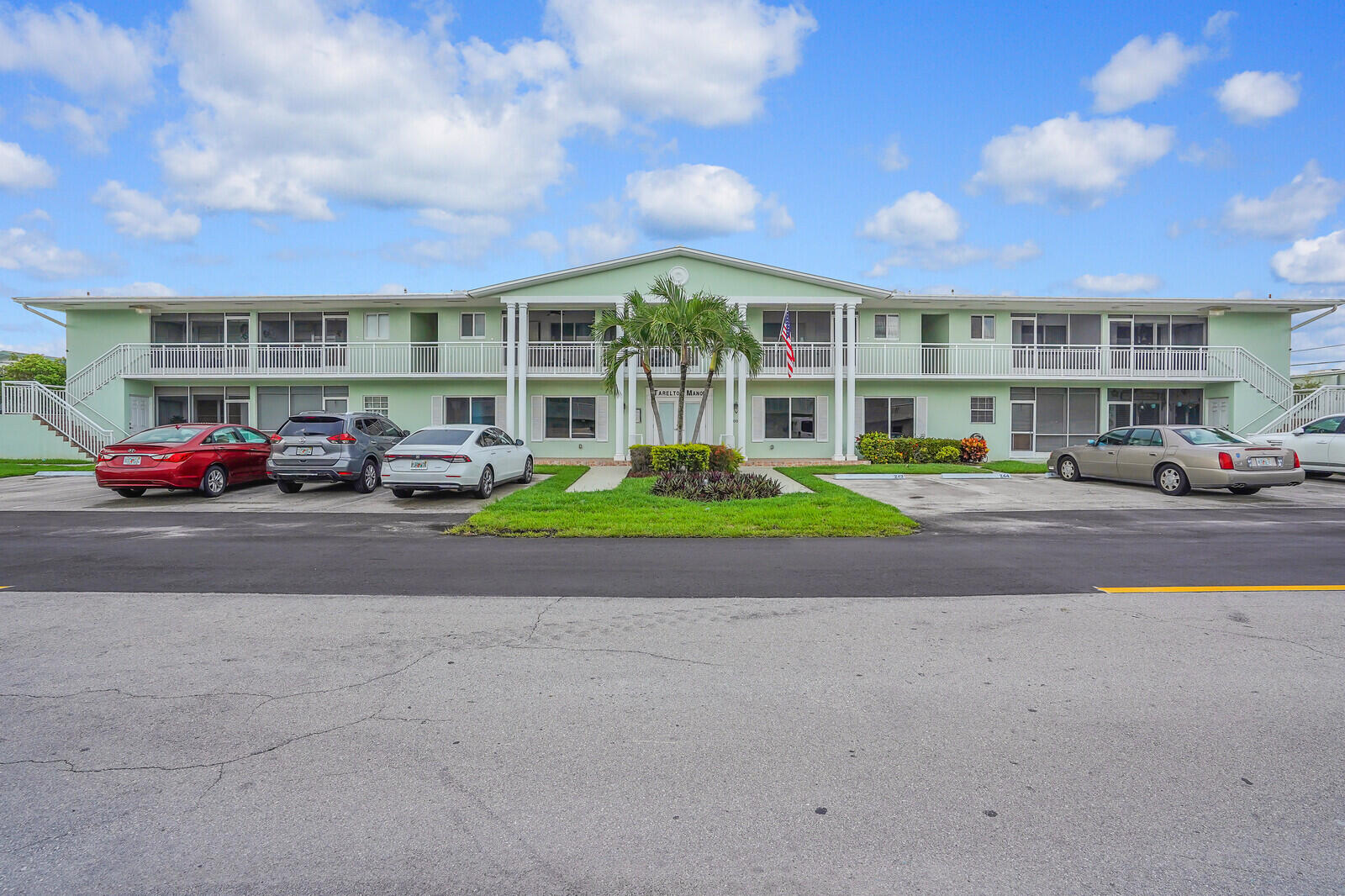 a cars parked in front of a building