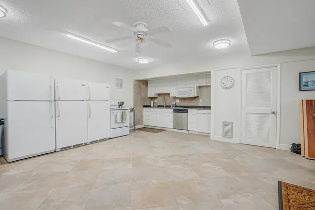 a view of cabinets and wooden floor