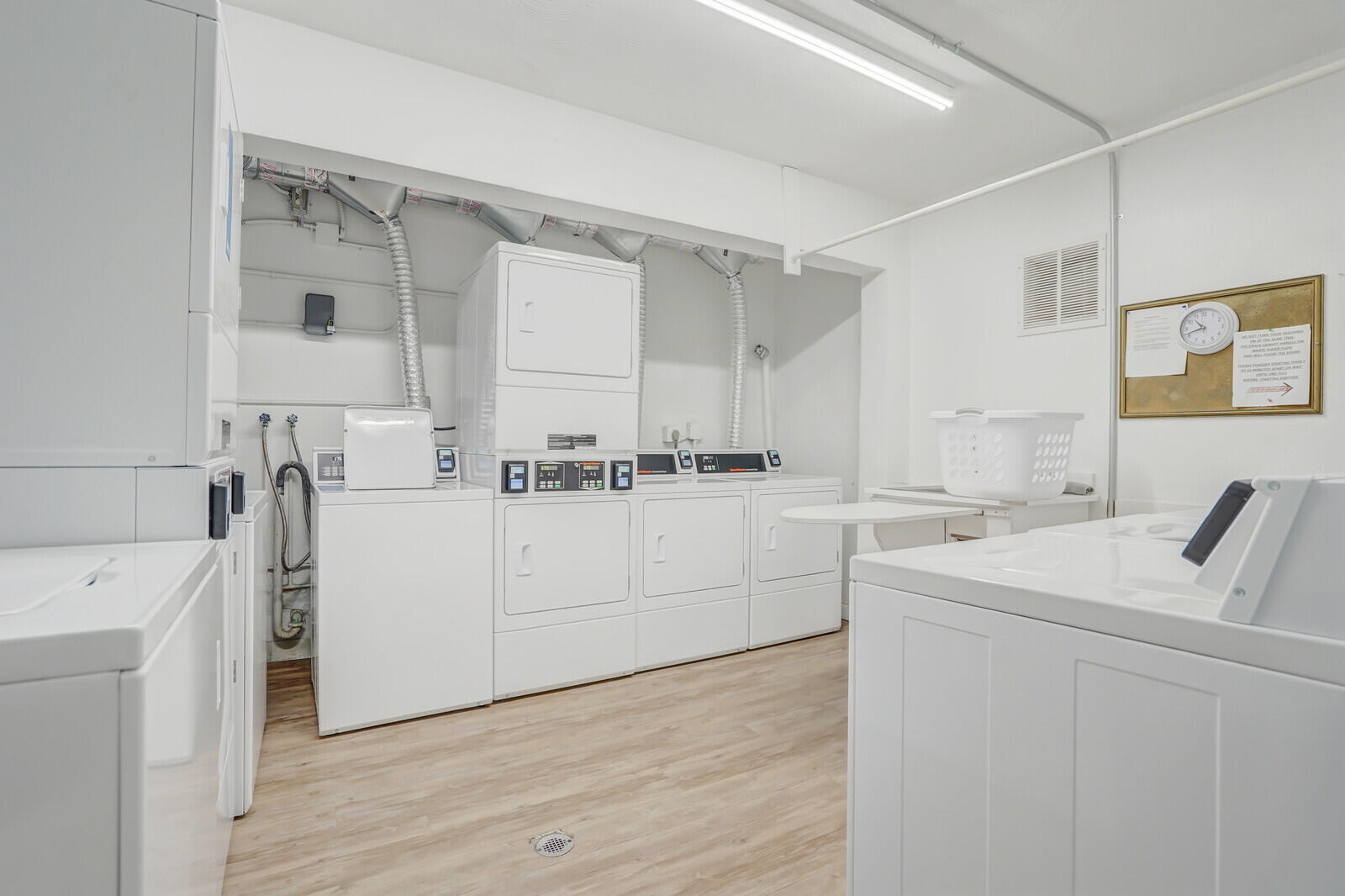 2100 Northeast 38th Street, Unit 111 Lighthouse Point, FL 33064 - Photo 25 of 25 a view of cabinets and wooden floor