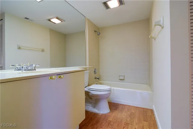 a kitchen with stainless steel appliances granite countertop a stove and a refrigerator