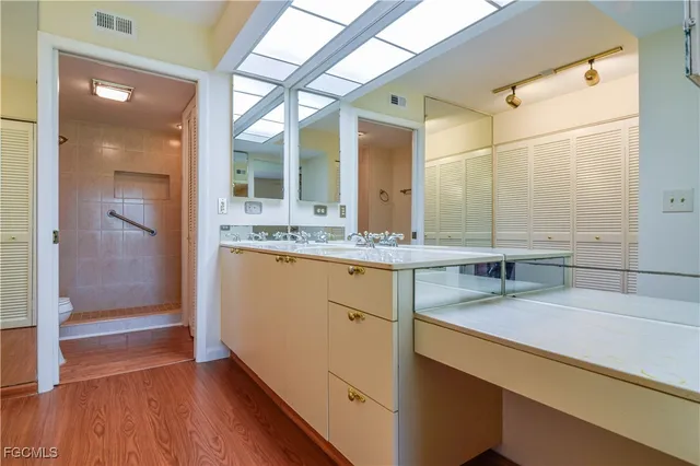 a bathroom with a shower and a toilet