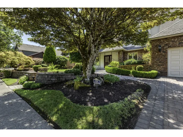a view of a house with a garden